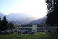 Beautiful shot of a crowd of tourist near the Laghi di Fusine lake in Italy