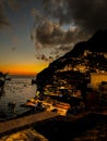 Beautiful shot of a dark sunset sky over the shore of Positano, Amalfi Coast, Italy Royalty Free Stock Photo