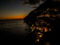 Beautiful shot of a dark sunset sky over the shore of Positano, Amalfi Coast, Italy Royalty Free Stock Photo