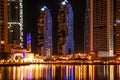 Beautiful shot of Dubai Marina towers and mosque at night