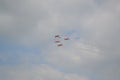 Beautiful shot of five warplanes in the sky going in the same direction.