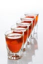 Beautiful shot glasses back lit. red Royalty Free Stock Photo