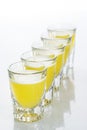 Beautiful shot glasses back lit. yellow Royalty Free Stock Photo