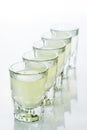 Beautiful shot glasses back lit. yellow Royalty Free Stock Photo