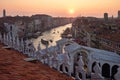 Beautiful shot of the Grand Canal in Venice, Italy during sunset with the Rialto Bridge visible Royalty Free Stock Photo