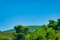 Beautiful shot of green landscapes with several wind turbines