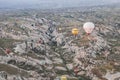 Beautiful shot of the hot air balloons over a landscape in the Cappadocia area in Turkey Royalty Free Stock Photo