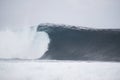 Beautiful shot of a huge sea wave with a foggy background