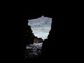 Beautiful shot inside the dark Tasmania remarkable cave by water in Australia