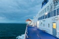 Beautiful shot of a lifeboat on the board of the ferry in the ocean under the cloudy sky