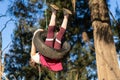 Beautiful shot of a little girl playing on a tire swing Royalty Free Stock Photo