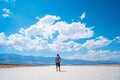 Beautiful shot of a man standing in the road of Death Valley in California, USA Royalty Free Stock Photo