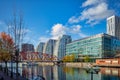 Beautiful shot of modern apartments looking over the old docks and swing bridge in Salford quays