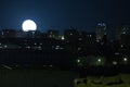 Beautiful shot of the moon over the beautiful city of Yerevan during nighttime