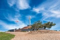 Beautiful shot of the Mt.Soledad National Veterans Memorial with a waving American flag in San Diego Royalty Free Stock Photo