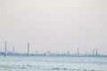 Beautiful shot of the Navodari refinery visible from a beach in Romania