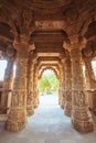 Beautiful shot of old many stone poles to light at the end in Dilwara Temples in Mount Abu, India