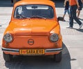 Beautiful shot of orange retro automobile from Fiat-Fico Fest 2022 in Sarajevo