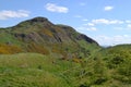 Beautiful shot of people in Arthur`s Seat in Edinburgh, Scotland Royalty Free Stock Photo