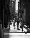 Beautiful shot of people walking on the streets of Miami in grayscale