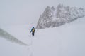 Beautiful shot of a person doing alpine climbing in the Mont Blanc Massif mountain in France Royalty Free Stock Photo