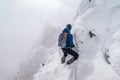 Beautiful shot of a person doing alpine climbing in the Mont Blanc Massif mountain in France Royalty Free Stock Photo