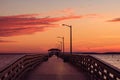 Beautiful shot of Pier, Orange skylit morning