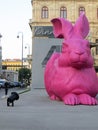 Beautiful shot of a pink rabbit statue next to Vienna State Opera in Vienna, Austria Royalty Free Stock Photo