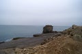 Beautiful shot of the Pulpit rock Portland Bill during a gloomy day in England