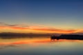 Beautiful shot of the reflection of the orange sunset sky in the water