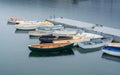 Beautiful shot of rowboats in the rain Royalty Free Stock Photo