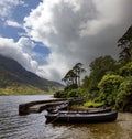 Beautiful shot of rowing boats in the river of Doo Lough, County Mayo in Ireland