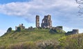 Beautiful shot of the ruins of Corfe Castle under blue sky and white clouds