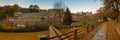 Beautiful shot of the Samos Monastery in Spain with ochre-colored leaves on the ground