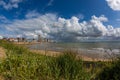 Beautiful shot of a sandy beach under the cloudy sky in Vlissingen, Zeeland, Netherlands