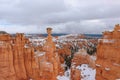 Beautiful shot of the scenic stone formations covered in snow in Bryce Canyon, Utah Royalty Free Stock Photo