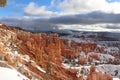 Beautiful shot of the scenic stone formations covered in snow in Bryce Canyon, Utah Royalty Free Stock Photo