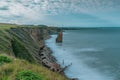 Beautiful shot of the Sea Stack on Chemical Beach near Seaham Harbour under a cloudy sky