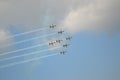 Beautiful shot of seven warplanes in the sky going in the same direction. Royalty Free Stock Photo
