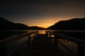 Beautiful shot of a silhouette of a pier in the sunset