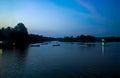 Beautiful shot of small boats parking in the river at late evening.