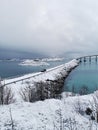 Beautiful shot of the snowy Sommaroy Bridge connecting the islands of Kvaloya and Sommaroy