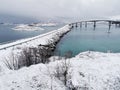 Beautiful shot of the snowy Sommaroy Bridge connecting the islands of Kvaloya and Sommaroy