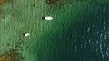 Beautiful shot of some boats in the water in Hamaroy, Nordland, Norway