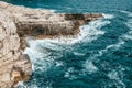 Beautiful shot of the splashing of water on the coastal area in Croatia Royalty Free Stock Photo