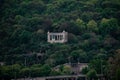 Beautiful shot of St. Gerard Sagredo Statue on a lush hillside in Budapest, Hungary