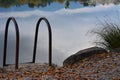 Beautiful shot of the stairs going down the water in the lak Royalty Free Stock Photo