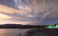 Beautiful shot of star trail over mountains Royalty Free Stock Photo