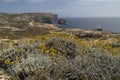 Beautiful shot of stunning rocky landscape surrounding Dwejra Bay, Malta