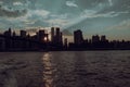 Beautiful shot of the sun setting over New York City and Brooklyn Bridge Royalty Free Stock Photo